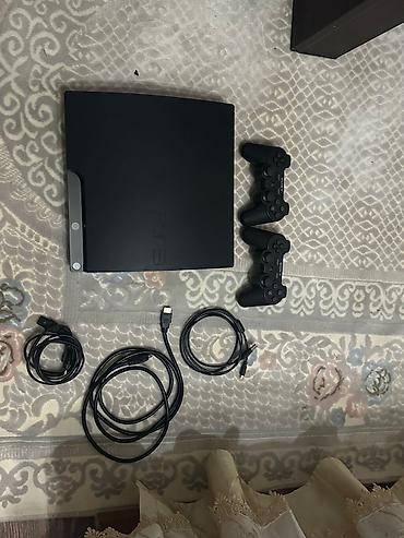 gta 5 pc: Sony PlayStation 3 (PS3) Slim oyun konsolu dəsti Paketə daxildir: - — 1