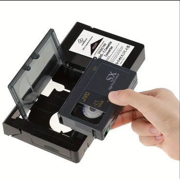 video çəkən: Bu, köhnə VHS-C kasetlərinizi adi VHS videokaset pleyerləri ilə uyğun