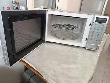 Mətbəx texnikası: SANYO Cook ‘n’ Grill mikrodalğalı soba Xüsusiyyətlər: - 1 100 W güc — 3