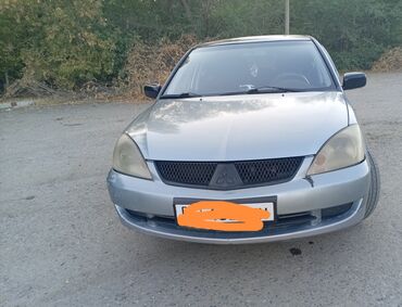 дом на колосах: Mitsubishi Lancer: 2005 г., 1.6 л, Механика, Бензин, Седан