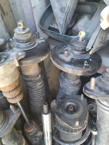 Амортизаторы, пневмобаллоны: Амортизатор передний задний Мазда Демио комплект Рф3 задний св6 задний — 2