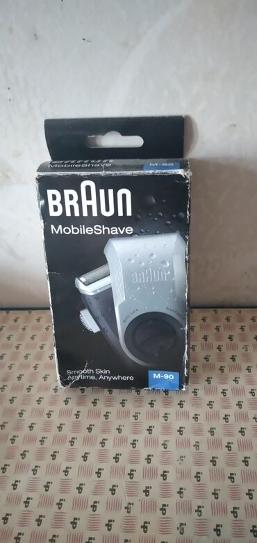 braun üzqırxan: Карманная дорожная элетробритва Braun M 90. Имеет компактную и