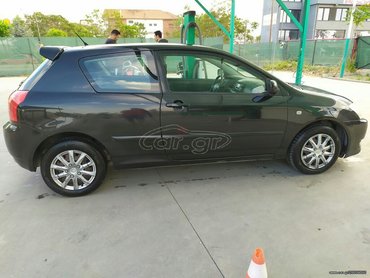 Toyota: Toyota Corolla: 1.4 l. | 2004 έ. Χάτσμπακ — 3