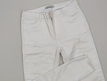 używane stringi: Jeansy damskie, rozmiar XL — 1