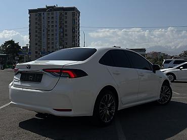 полики королла: Toyota Corolla: 2019 г., 1.8 л, Вариатор, Гибрид, Седан — 5