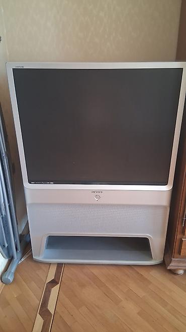 ev telefon altlığı: Satılır: böyük ekranlı arxa proyeksiyalı HDTV televizor və krem rəngli — 1