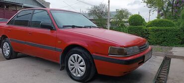 калонка авто: Mazda 626: 1991 г., 2 л, Механика, Бензин, Седан
