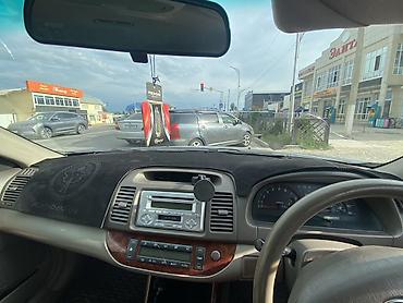 сломался комп: Toyota Camry XV30 (правый руль) — салон, накидка на панель алькантаро — 1
