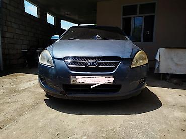 Kia: Kia Ceed hatchback - Kuzov: 5 qapılı hatchback, mavi-boz rəng - — 1