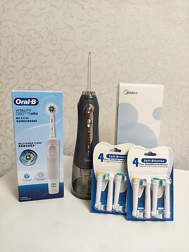 Ирригаторы: Ирригатор Oral-B, Портативный, Новый — 8