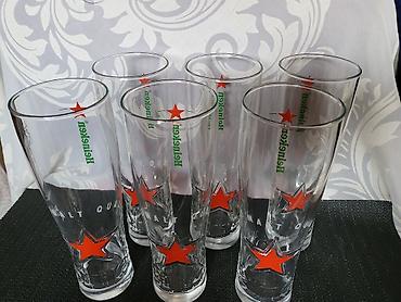 Čaše: Case nove za pivo Heineken. Case nove,sve na njima odsjaj od svetla — 5