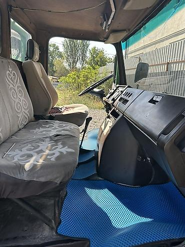 Унаа: Грузовой автомобиль Mercedes-Benz (кабина над двигателем), зелёный — 4