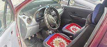 Другие автомобили: Компактный городской хэтчбек бордового цвета. Основные особенности: - — 7