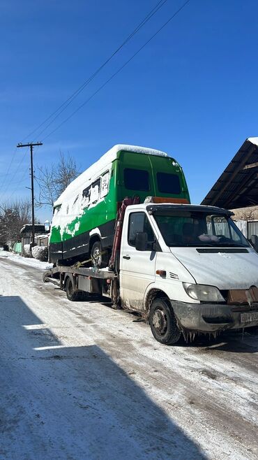 водитель помощник: Көтөргүсү менен, Гидроманипулятору менен, Кыймылдуу платформасы менен