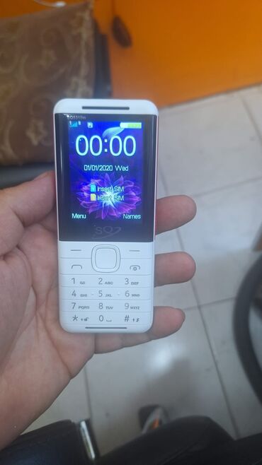 gizli nomre: Sadə telefon iki nomre magaza var 1 il zəmanətlə model sq5310