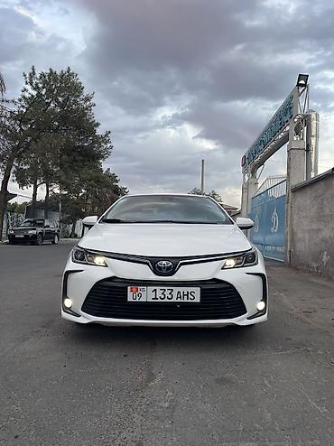 corolla 2022: Toyota Corolla: 2022 г., 1.8 л, Автомат, Гибрид, Седан — 2