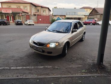 мазда 323 1 8: Mazda 323: 2002 г., 1.3 л, Механика, Бензин, Седан