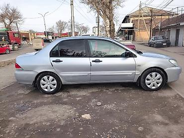 Mitsubishi: Mitsubishi Lancer: 2005 г., 1.3 л, Механика, Бензин, Седан — 5