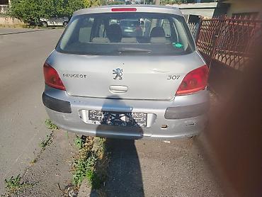 hsr 140: Peugeot 307, 5 vrata, srebrna boja. Benzin/dizel nepoznato sa ručnim — 5