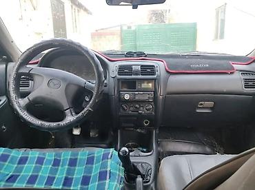 capella: Mazda 626: 1997 г., 1.8 л, Механика, Бензин, Хэтчбэк — 4