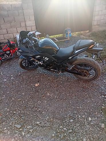 игрушечные мотоциклы: Спортивный мотоцикл Kawasaki Ninja (чёрный) - Кузов: полностью в — 4