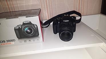 tecno spark 20c: Canon EOS 2000D fotoaparat, EF-S 18-55mm IS II Kit obyektivi ilə — 1