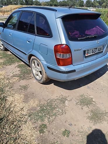 Транспорт: Mazda 323: 2000 г., 1.5 л, Механика, Бензин, Универсал — 4