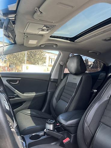 yük qazeleri: Hyundai Elantra: 1.6 l | 2012 il Sedan — 5