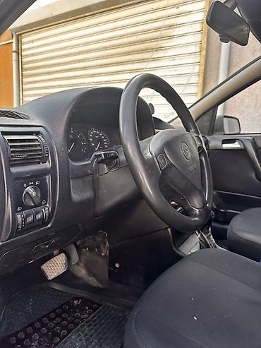 arxa yay: Opel Astra: 1.6 l | 1999 il Universal — 4