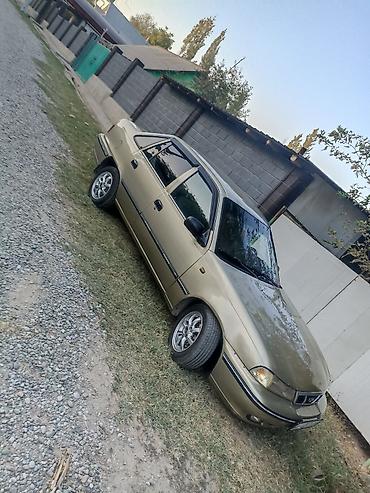 s 221: Daewoo Nexia: 2005 г., Механика, Бензин, Седан — 3