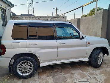 Mitsubishi: Mitsubishi Pajero IO (ağ rəng) – kompakt, çevik və tam ötürücülü — 2