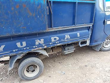 грузовой авто: Hyundai Porter II, малотоннажный бортовой грузовик. - Кабина — 5