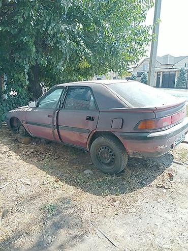 фильдер: Mazda 323 (седан) — комплект на запчасти - Кузов: 4‑дверный седан — 2