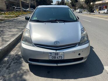 qizil gumus: Toyota Prius: 1.5 l | 2008 il Sedan