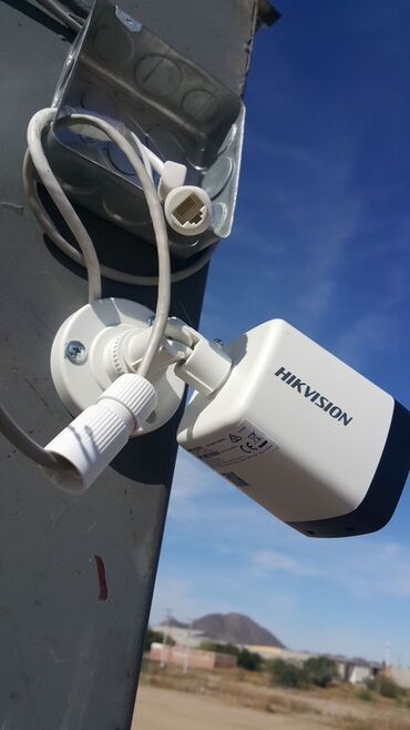 Видеонаблюдение: Камера видеонаблюдения Hikvision с разрешением H.265+. Белый корпус с