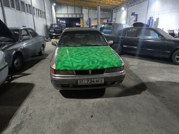 бачок омывателя нексия 2: Mitsubishi Galant: 1989 г., 2 л, Механика, Бензин, Седан