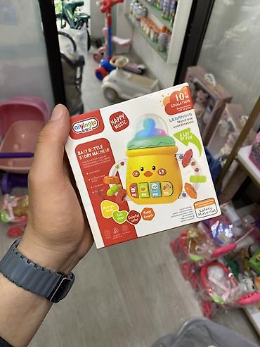 Развивающая музыкальная игрушка Aiyingle “Baby Bottle Story Machine”