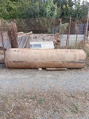 seif qapı: Metallik silindrik çən Su çəni azca su axidan yeri var yuxari hissəsi — 1