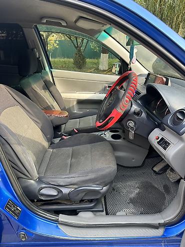 рекстон авто: Mazda Demio: 2003 г., 1.5 л, Автомат, Бензин, Хетчбек — 9