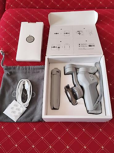 магна: DJI OM 4 — компактный 3-осевой стабилизатор для смартфона. Ключевые — 3