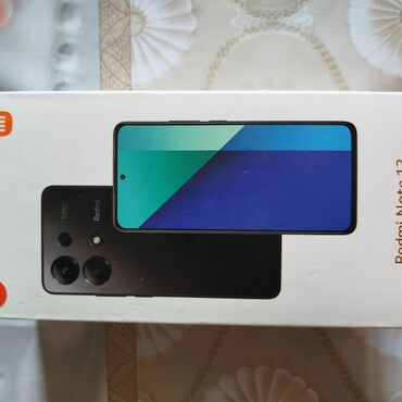 Redmi: Xiaomi Redmi Note 12 smartfonu geniş ekranı və arxa tərəfində üçlü