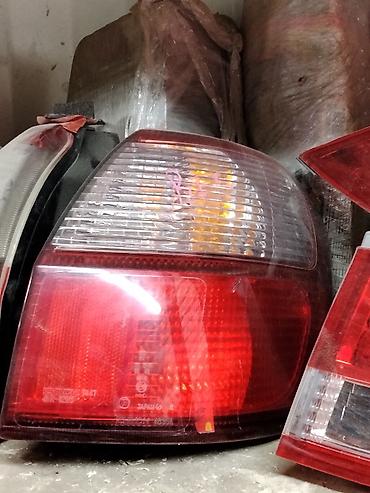 Задний фонарь (правый) для Toyota Corolla E110 седан/универсал конца