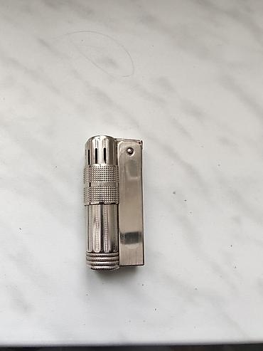 vuse go: Metal korpuslu klassik benzinli alışqan. Xüsusiyyətlər: - Retro — 1
