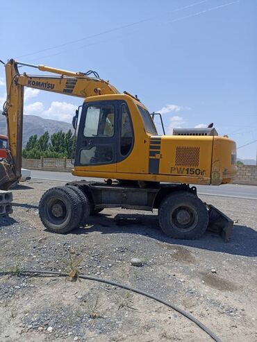 темир бутка: Экскаватор, Komatsu, 2004 г., Колесный