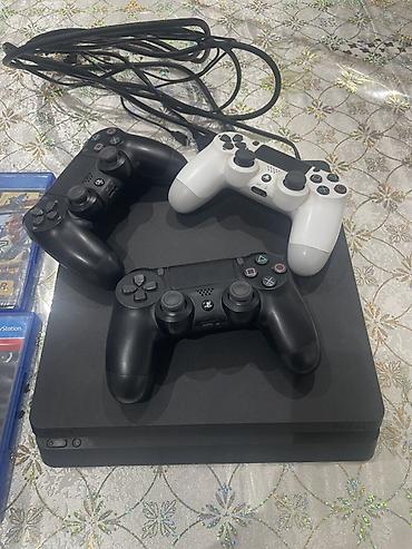 molekul 4: PlayStation 4 Slim oyun konsolu komplekti Paket tərkibi: - PS4 Slim — 4