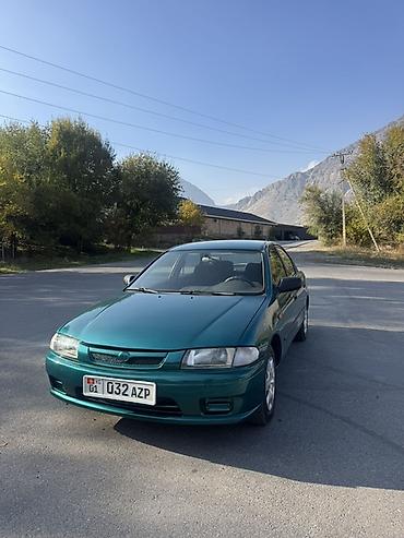 плуг для мтз трактора: Mazda 323: 1997 г., Механика, Бензин, Седан — 2