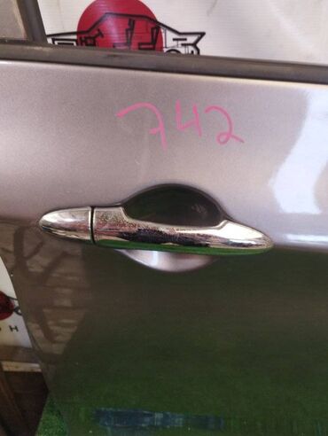 Катушки зажигания: Передняя правая дверная ручка Kia