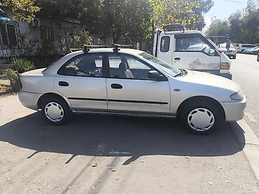 махда 323: Mazda 323: 1995 г., 1.6 л, Механика, Бензин, Седан — 1