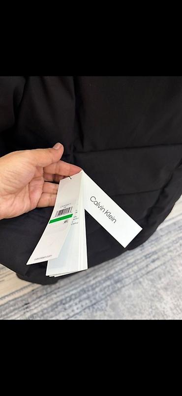 Женская одежда: Пуховик Calvin Klein, женский, черный, удлиненный. Особенности: - — 3