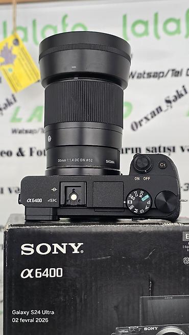 iphone 14 pro max adapter qiymeti: Sony Alpha a6400 üzərində Sigma 30mm f/1.4 lə. (2 batareka adaptr) — 8